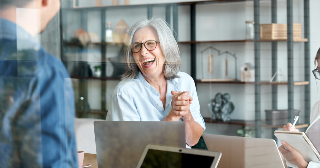 Woman laughing in an office