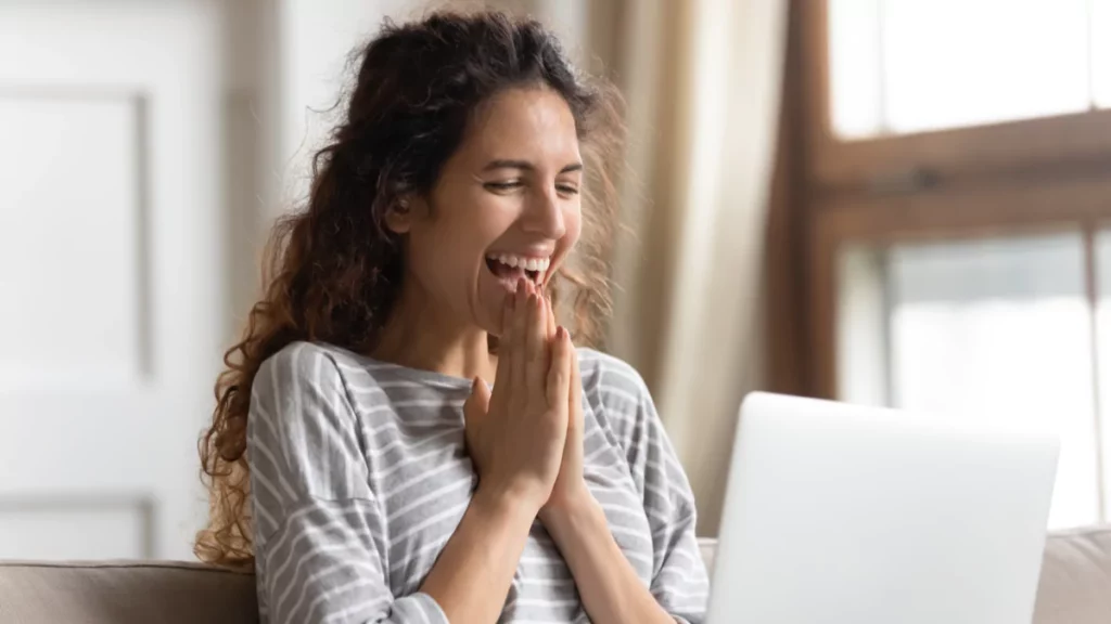 happy-woman-using-laptop