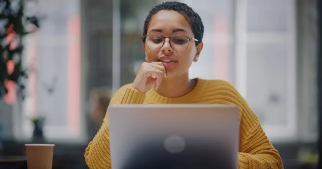 woman thinking on a zoom call