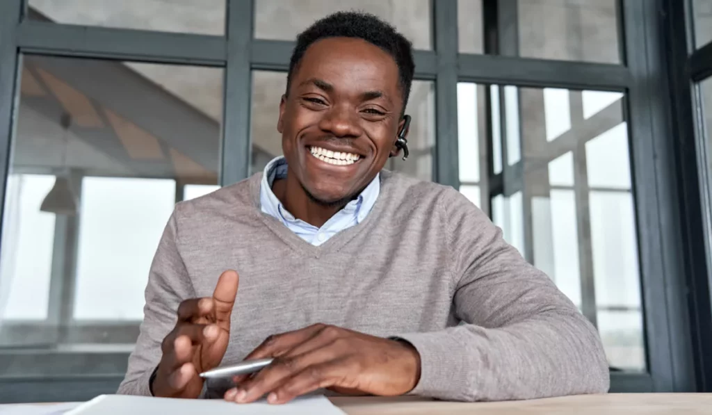 happy smiling man on a zoom call