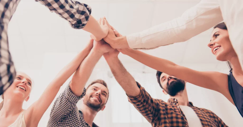 Strong team doing a high five