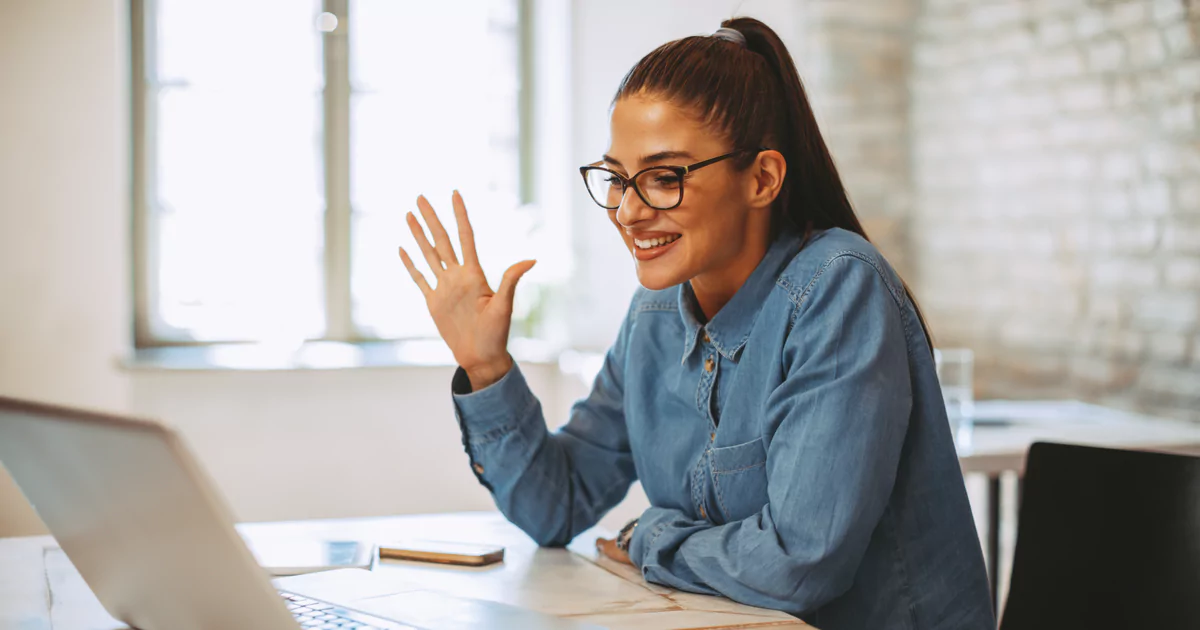 woman glasses waving laptop