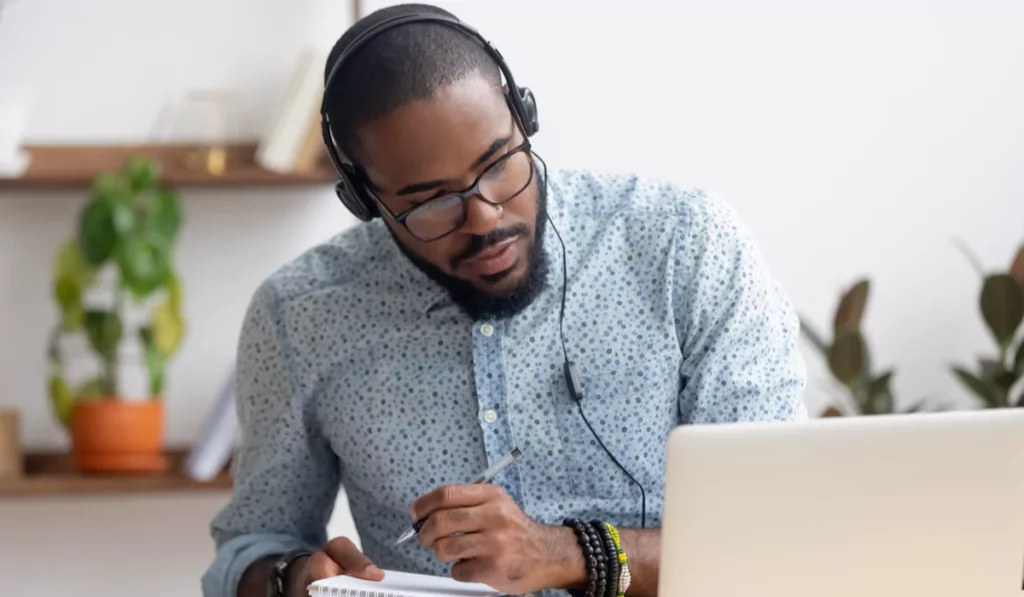 young-man-glasses-laptop-notebook