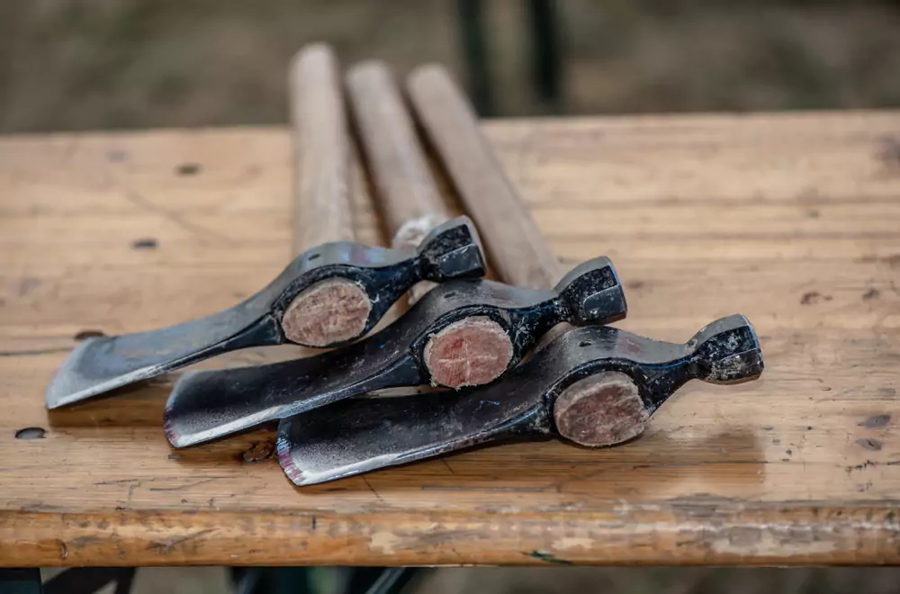 axes sitting on wood