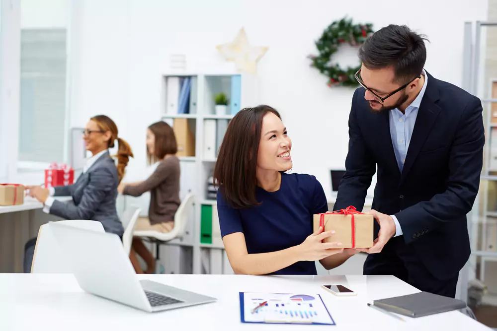 boss giving employee gift