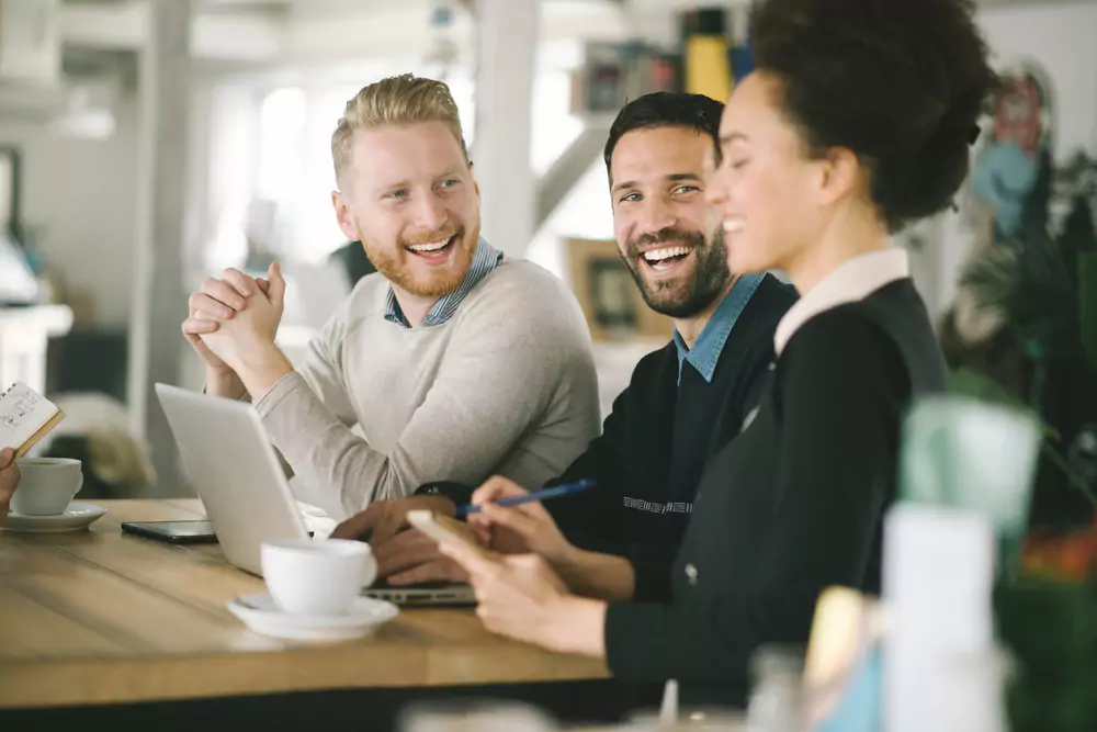 employees smiling and laughing