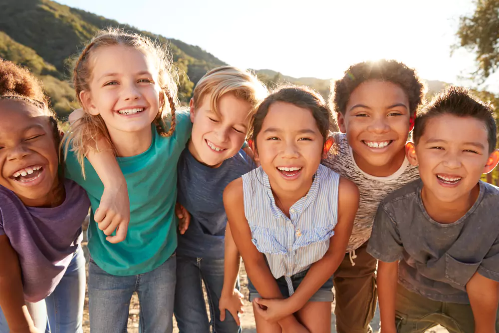 kids smiling at camera