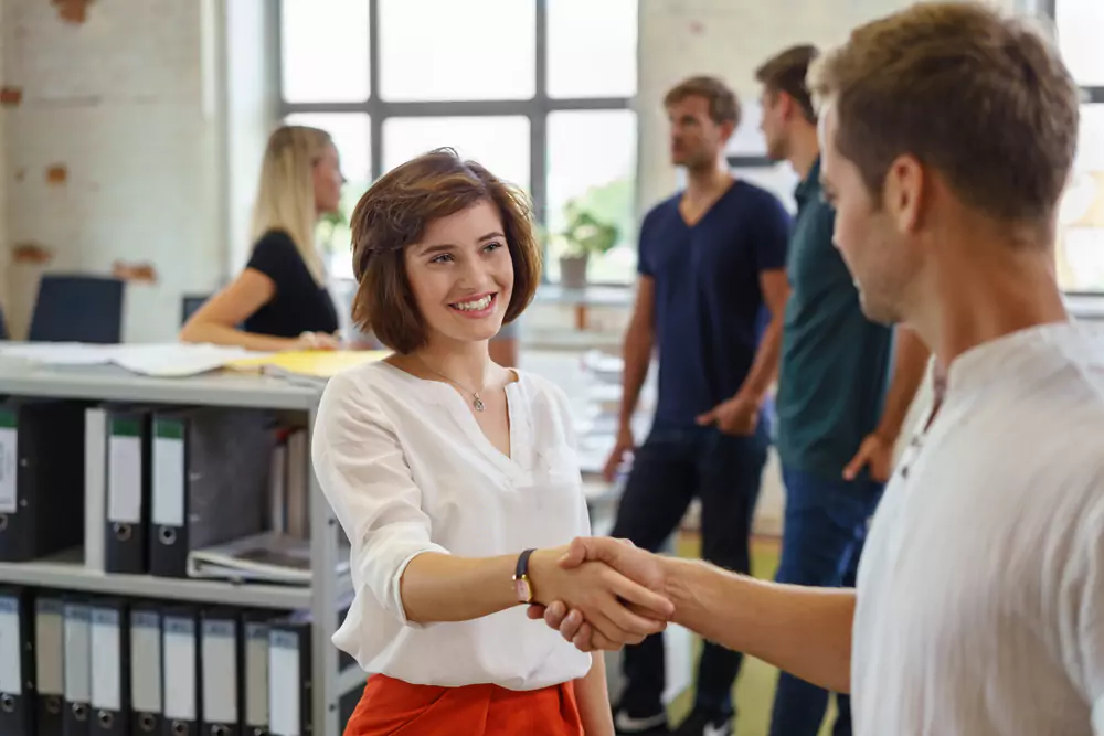 new employee greeting other employees