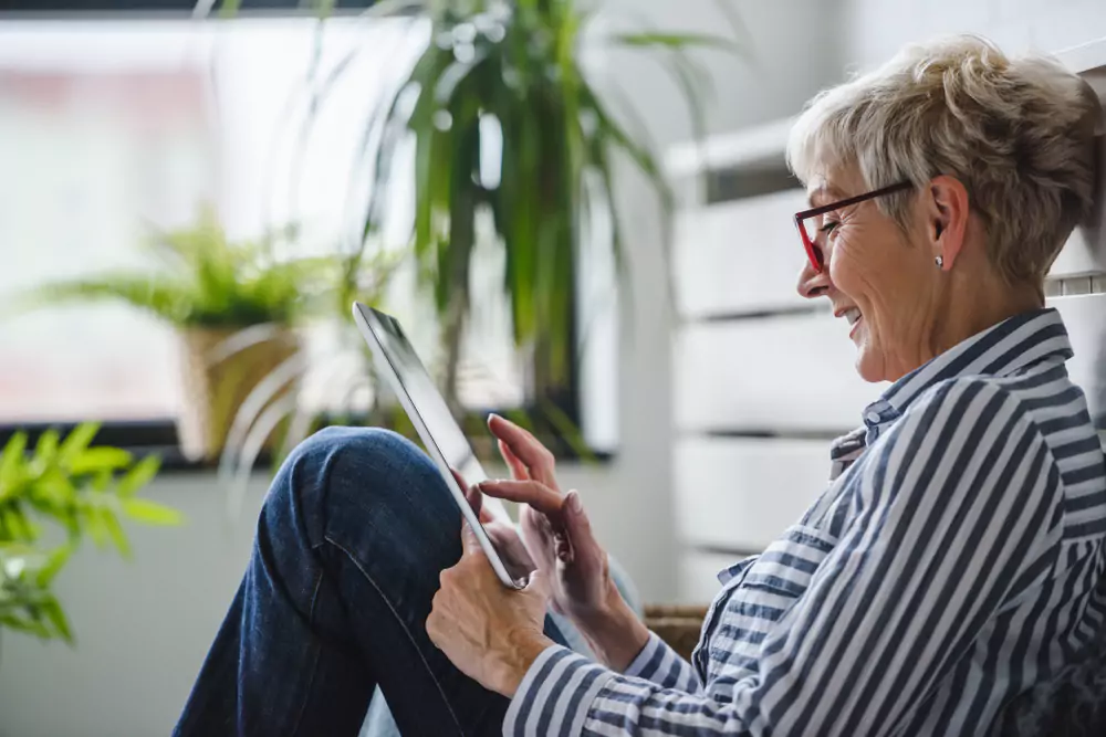 retired employee using tablet