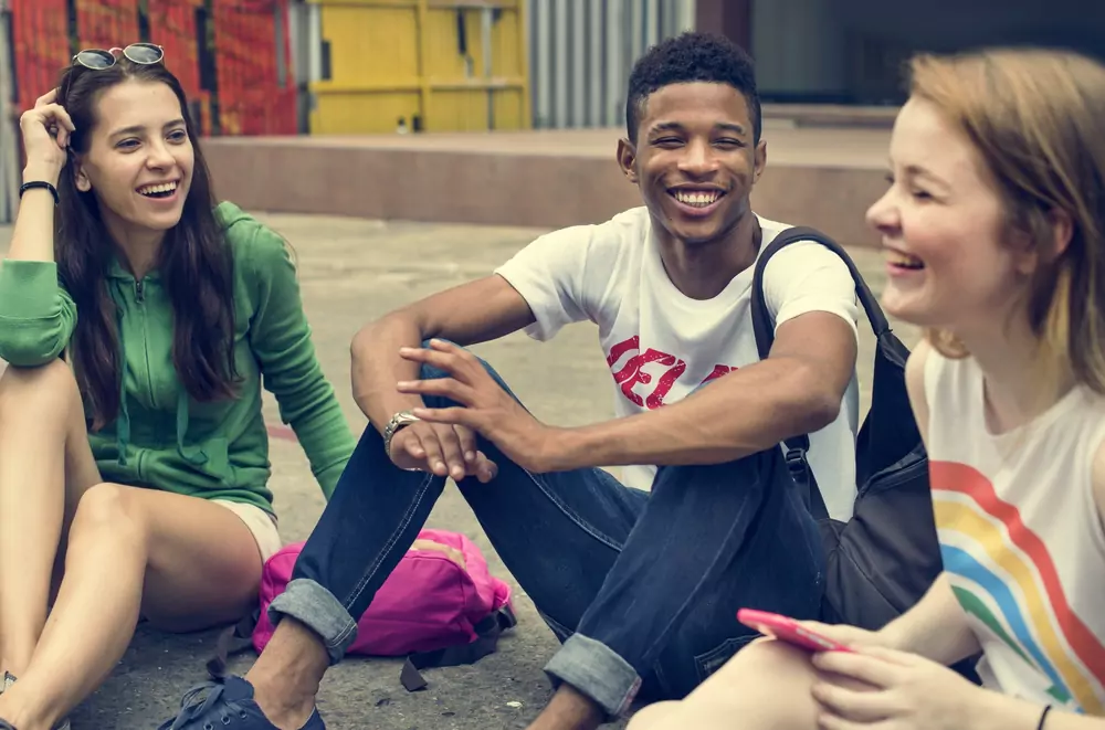 teenagers hanging out in a circle