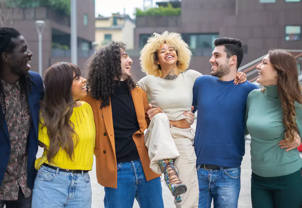 teenagers walking arm in arm