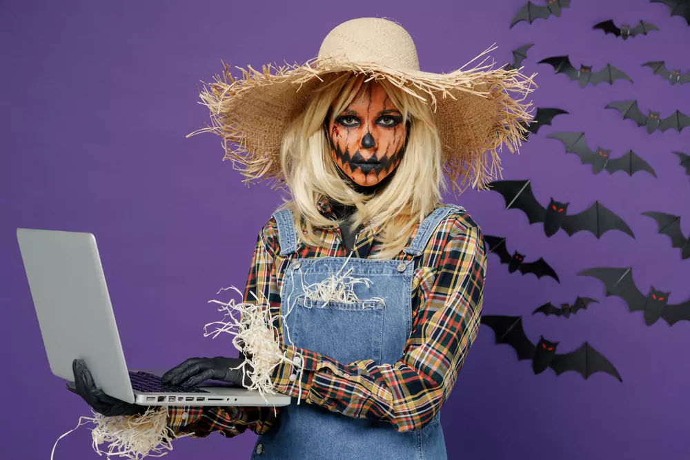 team member dressed as scarecrow
