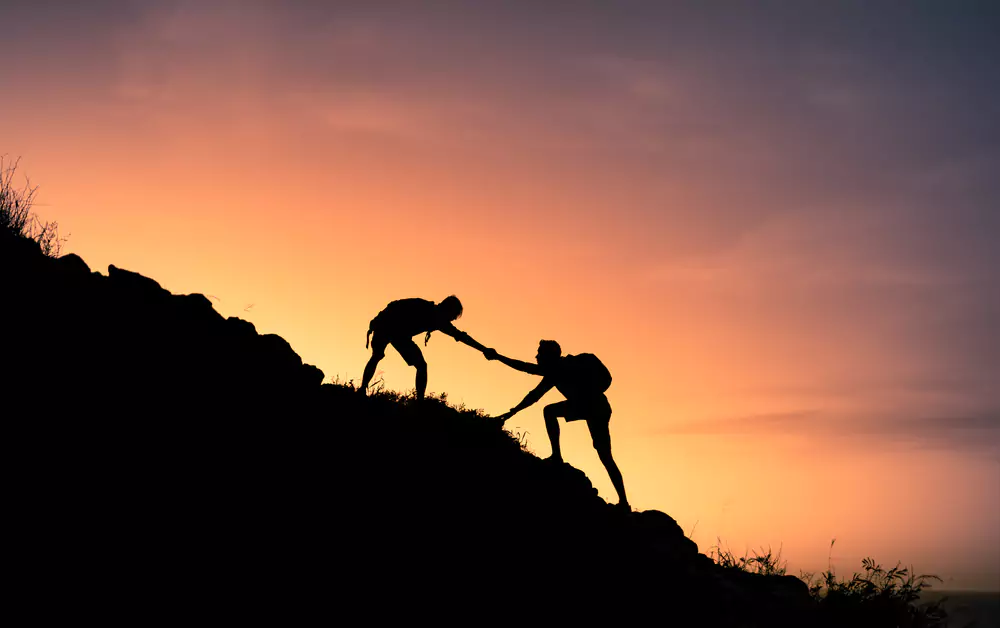 team members on a sunrise hike