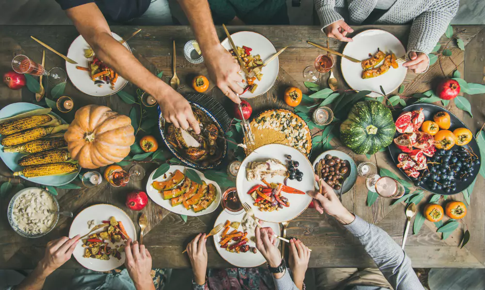 team members sharing office friendsgiving