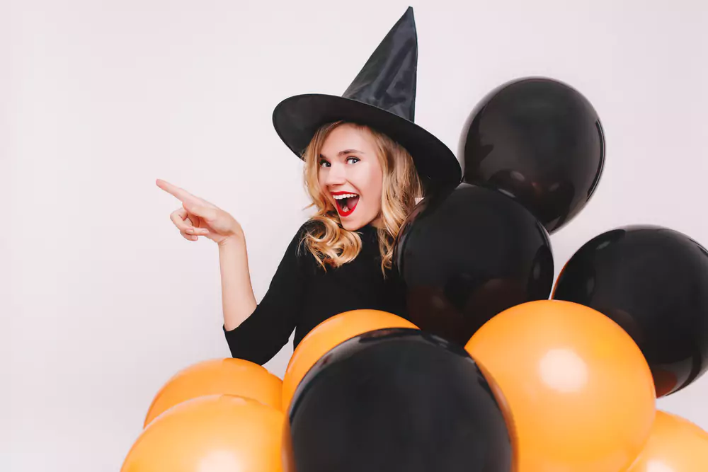 woman with halloween balloons