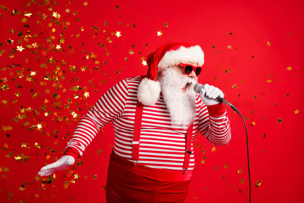 santa singing christmas songs