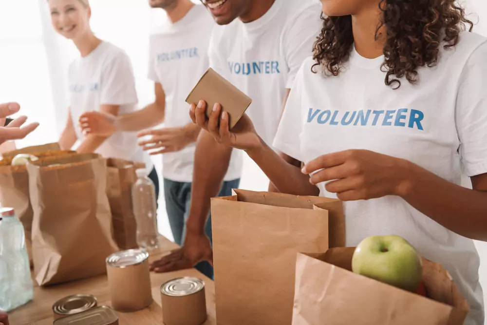 18 Charity Team Building Activities & Ideas for On-Site, Off-Site, & Virtual Teams