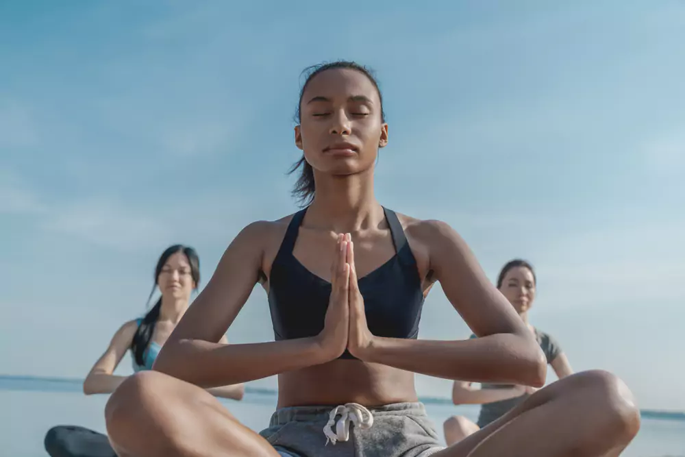 team members doing yoga